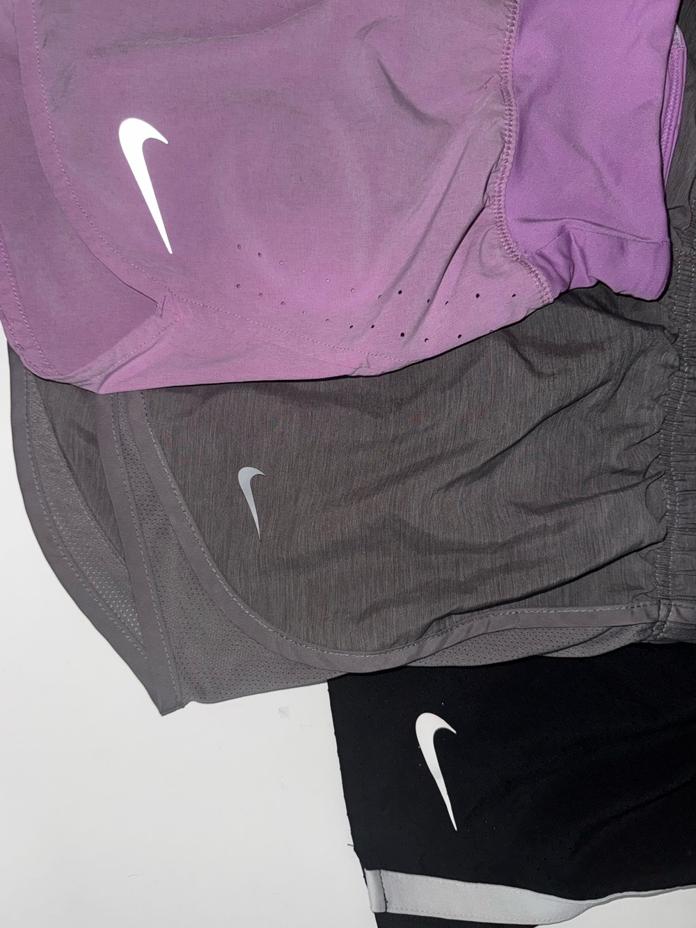 **BUNDLE** 3 Pair of Nike Shorts Size Medium in Light Purple, Gray, Black.